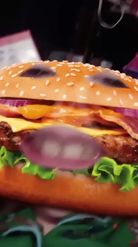 Preview for a Spotlight video that uses the burger face Lens