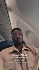 This first-person perspective video captures a passenger's journey on a flight departing from Las Américas International Airport in Santo Domingo, Dominican Republic. The footage includes views from inside the aircraft cabin, showing the passenger, the airplane window during takeoff, and the in-flight entertainment screens. by @delwinbazilme with outside in yo city looking good.🐐 by Contains: Stand On It - Lil Baby