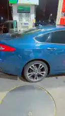 abdoufall205962 님이 만든 Original Sound 포함 @abdoufall205962 님이 만든 This short clip captures a blue car at a gas station during nighttime hours. The camera focuses on the vehicle and the fuel pump, providing a clear view of the current gas prices for regular, mid-grade, and premium gasoline. The scene offers a realistic glimpse into a common refueling experience.