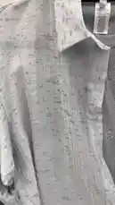 Watch this step-by-step styling guide by كود اناقتي to see how to wear a light grey button-up shirt over a sparkly grey top. This simple yet chic outfit idea is perfect for casual outings or work-from-home days. by @code.a3 with original sound