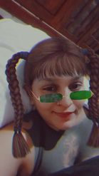 Preview for a Spotlight video that uses the Green Glasses & Bangs Lens