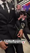 In this candid post-game interview, an NBA player, dressed in a sharp black suit and tie, shares his thoughts on a special moment he shared with his family. He expresses deep gratitude, stating that his family is the reason for his success. The scene captures the emotional side of professional sports, highlighting the importance of family support. by @nba with Original Sound by nba