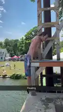 This short clip captures a man executing a clean dive from a wooden platform into a lake. The sequence shows him poised at the edge, launching himself forward, and entering the water with minimal splash. Other people can be seen enjoying the day on the grassy bank and swimming in the background. by @digiflips with Original Sound by digiflips