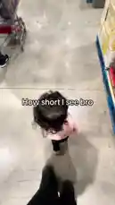 In this heartwarming clip, Gus The Great captures his young child walking through a store aisle. From the parent's point-of-view, the toddler runs ahead, creating a humorous perspective on their height difference. The text overlay "How short I see bro" perfectly encapsulates the playful dynamic. by @gusthegreats with Original Sound by gusthegreats