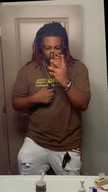 Watch PLAYBOII Q capture his morning routine in a mirror selfie video. He's seen styling his long dreadlocks while wearing a brown graphic t-shirt and distressed white jeans. This authentic moment offers a glimpse into his personal style and grooming habits. by @quezz.706 with original sound