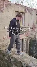 A young man explores a severely dilapidated brick house, walking through its crumbling walls and broken windows. The text overlay 'POV: The seller says the house just needs a light rehab' sets up a humorous contrast between the seller's claim and the property's true condition. He walks across a grassy area toward another section of the ruins, highlighting the extensive work required. by @cloud_ventures with cloud_ventures by Original Sound