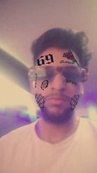 Preview for a Spotlight video that uses the Tekashi Face Tats Lens