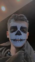 Preview for a Spotlight video that uses the Skull Face Paint Lens