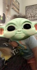 Preview for a Spotlight video that uses the Baby Yoda Head Lens