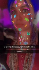 Preview for a Spotlight video that uses the Glowing Face Stickers Lens