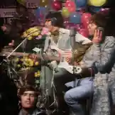A dynamic montage showcasing The Beatles across different eras and styles. The video begins with black-and-white footage of the band performing live, highlighting their early days. It transitions to vibrant color scenes from their later years, capturing their evolution in fashion and music. The sequence includes candid moments, studio recordings, and iconic performances, illustrating their journey from a British rock band to global superstars. The energetic rock music complements the visual narrative, emphasizing their enduring legacy. by @thebeatles with Original Sound by thebeatles
