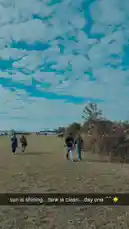Join Sasha as she explores a scenic field under a vibrant blue sky. From wide shots of the landscape to a close-up selfie, the video captures her enjoying the outdoors. The scene includes a large truck and white tents in the background, suggesting a festival or event. This is a perfect example of capturing everyday moments with style. by @squashha with squashha by Original Sound