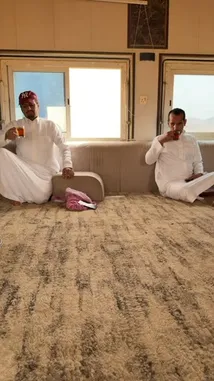 In this hilarious desert camping prank, two men in traditional white robes prepare for a relaxing tea break. But their plans take a wild turn when a third man, hidden in a large bag, launches a surprise attack. The video captures the entire chaotic and comedic sequence from the initial calm to the sudden ambush, showcasing a classic prank scenario. by @manahi.20 with manahi.20 by Original Sound