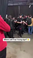 Behind-the-scenes footage captures Trae Young arriving at a signing event, surrounded by media and security. The crowd buzzes with anticipation as fans and reporters await his arrival. This exclusive look offers a real-time glimpse into the moments leading up to a major sports signing. by @yahoosports with Original Sound by yahoosports