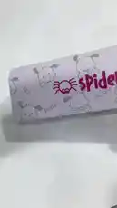 A hand unboxes a pair of Spider brand glasses from a cute, cartoon-themed case. The video shows the glasses being removed, highlighting their black frame with yellow temple tips and the Spider logo on the lenses and arms. The presentation concludes with the MedFrame Optics logo and tagline. by @medframe with Original Sound by medframe