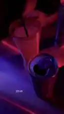 tufavlatiino 님이 만든 Original Sound 포함 @tufavlatiino 님이 만든 This video captures the essence of San Jose nightlife through a series of intimate, dimly lit shots. It begins with a close-up of a can of White Claw and a drink with a straw on a table bathed in vibrant red and purple neon light. The camera then pans slightly to reveal more cans of White Claw, suggesting a social gathering. The overall atmosphere is relaxed and casual, perfect for unwinding after a long day.