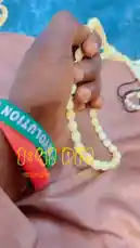 abdoufall205962 님이 만든 Original Sound 포함 @abdoufall205962 님이 만든 This intimate close-up video follows Abdou Fall as he engages in a personal prayer ritual. The camera focuses tightly on his hands, which are adorned with a 'REVOLUTION' wristband, as he carefully manipulates a string of light-colored prayer beads. The setting appears to be a quiet, contemplative space with a blue patterned rug in the background. The audio features a male voice speaking in Arabic, creating a serene and spiritual atmosphere.