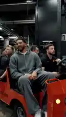 In this behind-the-scenes clip from the Boston Celtics facility, star player Jayson Tatum is seen having a lighthearted moment while sitting in a forklift. He playfully sticks his tongue out and makes hand gestures towards the camera, showcasing the fun and relaxed side of NBA athletes during downtime. by @celtics with Original Sound by Contains: My Sheila - Robin Hood