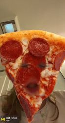 Preview for a Spotlight video that uses the Pizza slice Lens