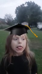 Preview for a Spotlight video that uses the Graduation Cap Lens
