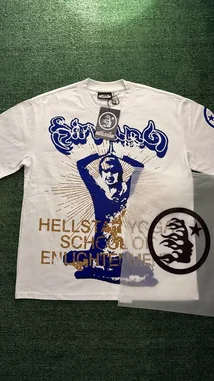 Watch as the new Hellstar 'Yoga School of Enlightenment' t-shirt is revealed in this unboxing video by @flacoplugz. The white tee features bold blue and gold graphics, including a striking silhouette and radiant sunburst design, all presented on a textured green background. This look combines edgy streetwear aesthetics with a spiritual twist. by @flacopyo with original sound
