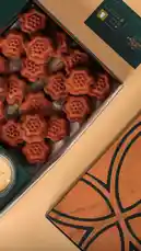 Watch as MOLADONE presents its exquisite chocolate pastries in a beautifully designed box. This elegant unboxing experience highlights the intricate flower-shaped treats and sophisticated branding, perfect for gifting or indulging. by @moladone with original sound