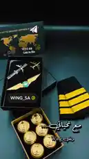 Watch as a stunning pilot-themed gift set is revealed, featuring authentic-looking wings, captain's epaulets, model airplanes, and commemorative coins. This unboxing showcases a perfect gift for aviation enthusiasts or pilots, presented by Wing ونق. by @wing_sa with Samra (Sped Up) by Talia Lahoud