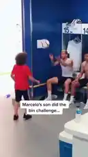 In a heartwarming display of talent and sportsmanship, Marcelo's young son steps into the spotlight inside the Real Madrid locker room. He skillfully juggles a soccer ball over the heads of several players seated on benches, including teammates like Benzema and Kroos. The challenge culminates in a joyful group celebration where the players lift him onto their shoulders, showcasing the team's camaraderie and support for the next generation. by @eirakoze64 with Original Sound by footballdaily24