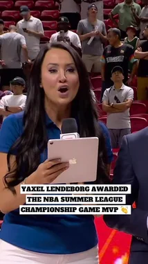 A female reporter announces the winner of the MVP trophy during the 2026 NBA Summer League Championship Game. Yakso Lindberg is then shown on stage, smiling broadly as he lifts the championship trophy above his head in celebration. by @nba with Original Sound by nba