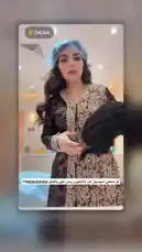 A woman, identified as Bella Clinic KSA, speaks directly to the camera in a modern clinic setting. She announces her upcoming cosmetic procedures, stating she will have lip fillers and then get Botox, promising a luxurious result. The Arabic text overlay confirms she is discussing the treatment process. by @bellaclinickw with Original Sound by bellaclinickw