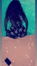 A woman with long dark hair dances provocatively by a pool at night. She wears a white top and black shorts with a prominent leaf pattern. Sparkle effects are overlaid on the footage, enhancing the party-like atmosphere. by @seriouslyfd with Original Sound by seriouslyfd