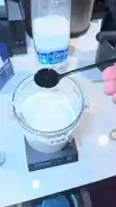 Watch as يُوسف عبدالرحمن demonstrates a simple step in preparing a yogurt-based drink. In this close-up shot, he adds a spoonful of honey into a container of yogurt, showcasing a quick and healthy ingredient combination perfect for breakfast or a snack. by @alysf90 with Original Sound by alysf90