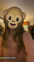 Preview for a Spotlight video that uses the MONKEY EMOJI FACE Lens