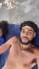 This short clip captures a peaceful day outdoors. It begins with a view of a clear blue sky through a window frame, then transitions to a shirtless man and a young child lying together on a blue mat on a concrete surface, enjoying the sunshine. The overall atmosphere is calm and relaxed. by @marcus.randall with Summertime by DJ Jazzy Jeff & The Fresh Prince