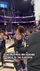 The Valkyries basketball team erupts in celebration after securing a playoff spot, surrounded by cheering fans and dramatic smoke effects in a packed arena. by @wnba with Original Sound by wnba