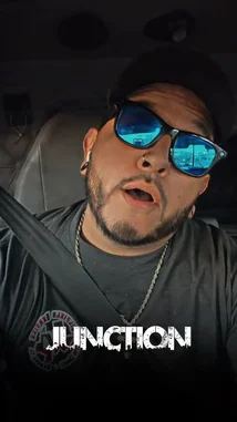 A man, identified as Tomas Guerrero, films himself driving his truck through heavy traffic. He speaks to the camera about being 'back on the road' after five hours of travel. The video captures his personal vlog-style journey from behind the wheel. by @tomasg3901 with Original Sound by tomasg3901