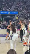 This high-energy clip captures Sabrina Ionescu of the New York Liberty driving to the basket during a crucial moment in a WNBA game. Her teammate, Breanna Stewart, sets a screen as they execute a play against the Los Angeles Sparks. The crowd is electric, reacting to the intense action on the court. by @wnba with Original Sound by wnba