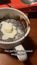 Watch as Gus The Great prepares his signature microwave mug cake. This quick and delicious treat features a rich chocolate base topped with creamy vanilla ice cream, creating a decadent single-serving dessert. by @gusthegreats with Original Sound by gusthegreats