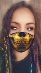 Preview for a Spotlight video that uses the Gold Skull Mask Lens