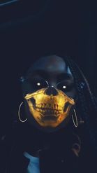 Preview for a Spotlight video that uses the Gold Skull Mask Lens