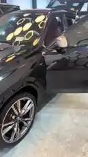 A detailed walkthrough of a new black BMW, showcasing its sleek exterior design, premium red leather interior, modern dashboard, and spacious cabin. This first-person perspective highlights the car's luxurious features and pristine condition, perfect for anyone interested in new car reveals. by @reflection.car with Original Sound by reflection.car