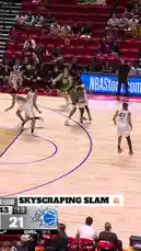 Watch an electrifying slam dunk during an NBA Summer League game. A player in a green jersey drives to the basket against defenders in white uniforms, soaring for a powerful one-handed dunk. The crowd erupts as the ball goes through the net, showcasing the athleticism and excitement of the league. by @nba with Original Sound by nba