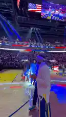 This energetic clip captures Golden State Warriors players arriving on the court before a game. They exchange high-fives and show team spirit as they walk past fans and under the arena's bright lights. The atmosphere is electric, showcasing the excitement of a live NBA event. by @warriors with original sound