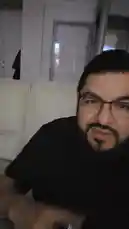 In this short clip, comedian David Valenz shares a candid moment, making exaggerated facial expressions and reacting with surprise. The close-up shot captures his expressive reaction in a casual indoor setting, highlighting his comedic style. by @mrvechain with Original Sound by mrvechain