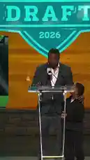 Witness a heartwarming moment at the 2026 NFL Draft as an Eagles player shares the stage with his young son. The father speaks at the podium while his son looks on with pride, capturing a powerful family milestone. by @eagles with Original Sound by eagles