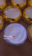 In this close-up showcase, the beauty brand Semsema Herbal Beauty presents its new skincare line. A hand wearing a pink glove demonstrates two distinct creams: one white, labeled as a night cream, and another vibrant yellow, presented as a day cream. The speaker describes their benefits, including skin brightening, evening out complexion, reducing pigmentation, and intense hydration suitable for sensitive, dry, or rosacea-prone skin. by @semsemallc25 with Original Sound by semsemallc25