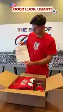 A young man receives a special gift package from the San Francisco 49ers. He unboxes various items, including a McCaffrey jersey and a mini helmet, expressing his excitement and gratitude. The video features on-screen text like 'GOOD LUCK, USMNT!' and 'SHOUT GIFTZ,' highlighting a cross-sport appreciation moment. by @sf49ers with Original Sound by sf49ers