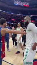 In a post-game moment, Boston Celtics star Jayson Tatum celebrates with teammates and fans after a victory over the Cleveland Cavaliers. He shares a heartfelt embrace with a teammate, then removes his jersey to reveal his physique before heading to the tunnel. The crowd cheers as he walks off the court, capturing the energy of a hard-fought win. by @celtics with Original Sound by celtics