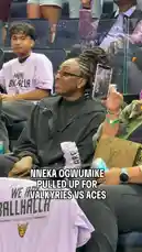 WNBA star Nneka Ogwumike is spotted in the stands at a Valkyries vs Aces game, wearing a black outfit and glasses. She smiles and waves at the camera while enjoying the event. by @wnba with Original Sound by wnba