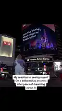In a powerful moment captured on camera, artist TALK stands before a massive digital billboard at Toronto Eaton Centre, which displays their image as part of Spotify's 'Discover New Artists' campaign. Overwhelmed by the sight of their dream realized after years of effort, TALK breaks down in tears, visibly moved by the recognition. This raw reaction to achieving a long-held goal is a testament to perseverance and the impact of music discovery platforms. by @iamtalk with iamtalk by Original Sound
